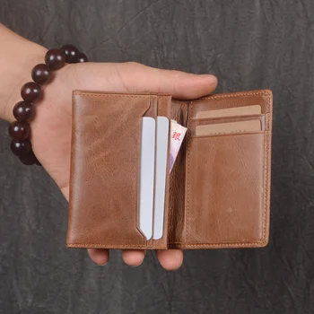 Мужской кожаный бумажник для переноски, женская клеенчатая сумка с несколькими картами, короткий кошелек большой емкости.